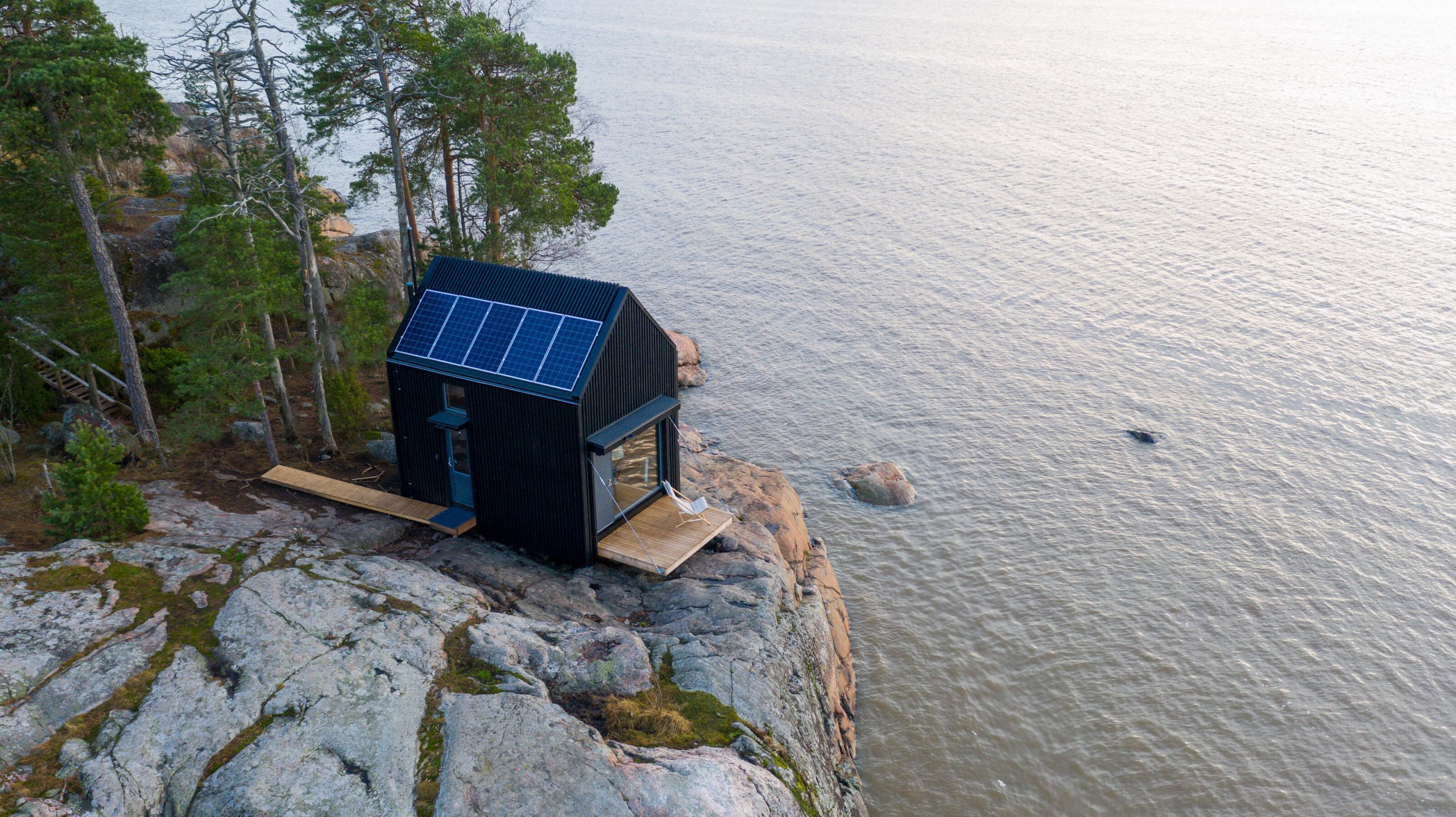 A minimalistic off-grid hut off the coast of the Baltic sea in Finland.